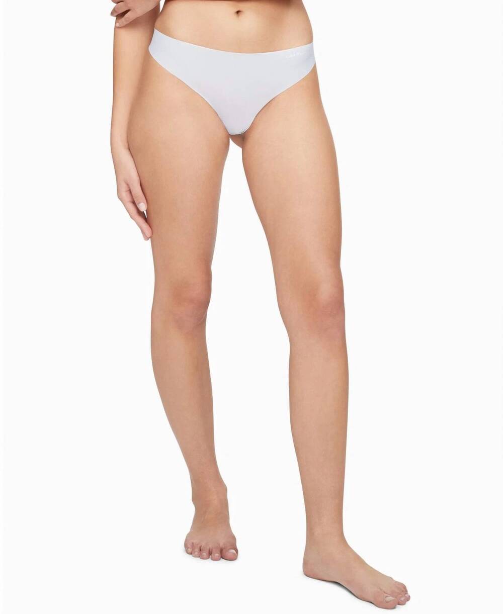 NEW CALVIN KLEIN women's invisibles thong panty in polished blue
